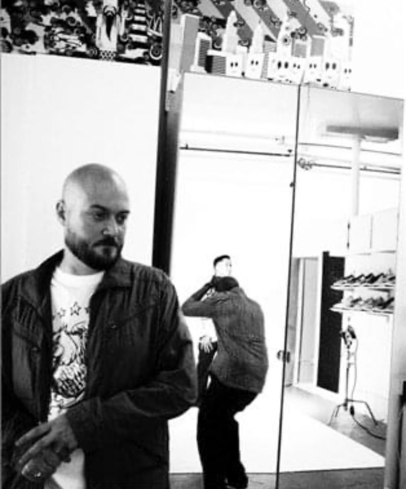 David Gensler in a studio environment during a fashion shoot, reflecting creative direction and design culture