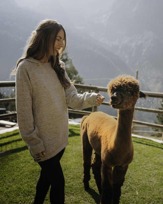 paka brand lifestyle female with alpaka