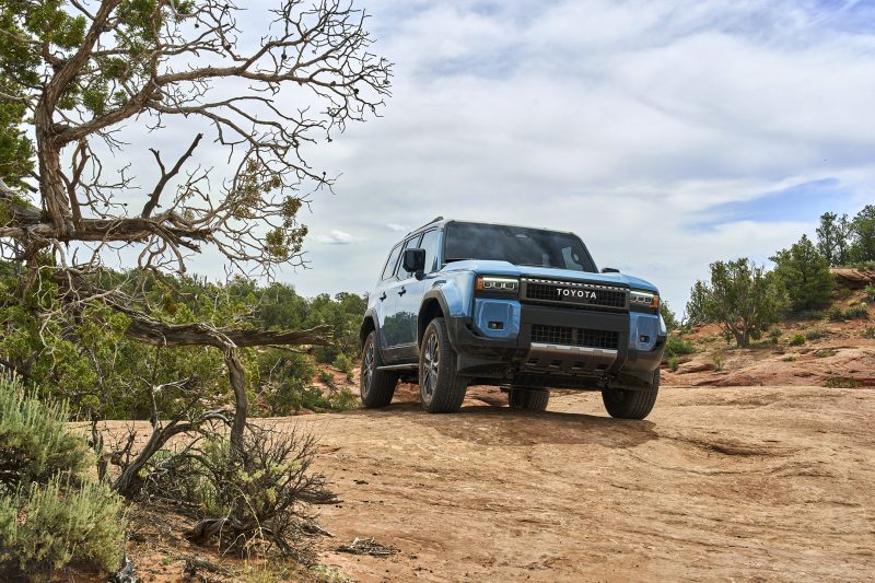 2027 Toyota Land Cruiser photographed in a rugged desert landscape, reflecting the outdoor automotive aesthetics discussed by David Gensler in his VANISH interview.