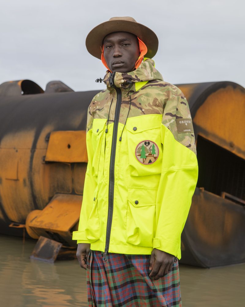 David Gensler outdoor style reference showing a Griffin neon yellow and camouflage technical jacket with oversized pockets.